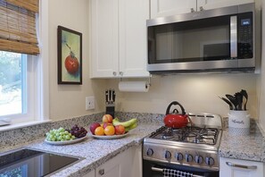 A culinary haven awaits in our sleek and functional kitchen