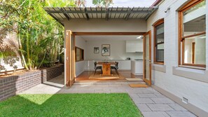 Bright and spacious living area with seamless indoor-outdoor flow. Perfect for relaxing or entertaining guests.