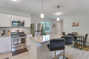 Kitchen | In-Unit Laundry | Central Heating & A/C