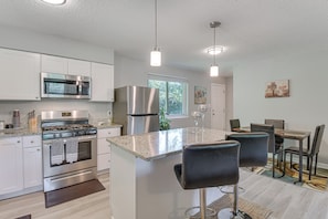 Kitchen | In-Unit Laundry | Central Heating & A/C