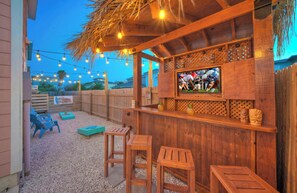 This tiki bar is your ticket to a year-round vacation vibe at home! (Cheeky Tiki)