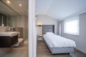 Unit with Twin size bed + Bathroom