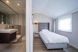 Unit with Twin size bed + Bathroom