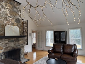 The fireplace is for looks only unfortunately but this is a great hangout space.