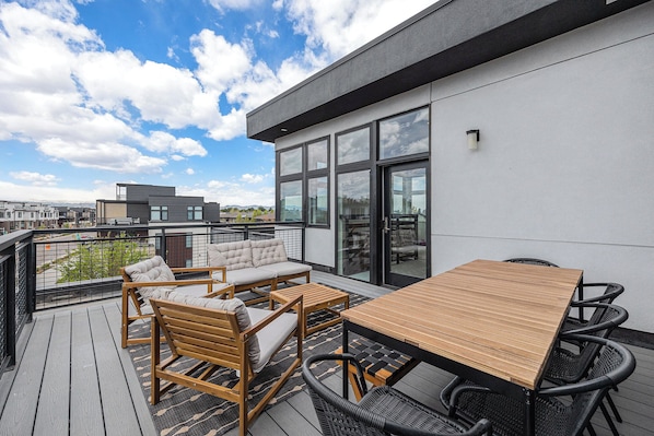 Enjoy the daylight from a comfy terrace, perfect for catching up.