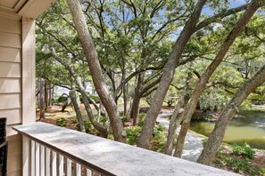 Granite Bar Top for Dinner and Drinks with beautiful Oak lined views to the beach.  The Lagoon features koi, turtles and an occasional Blue Heron.  It has a wonderful water fountain sound for peaceful nights.  