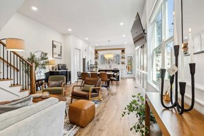 Living Room 1, First Floor.
We have everything you need for 12 guests. 
Fully equipped Kitchen, 
Wine refrigerator, 
2 Coffee Keurig K-Elite machines with complimentary K-Cups Coffee & Tea, 
2 Cuisinart Toasters, and more to comfort 12 guests.  
