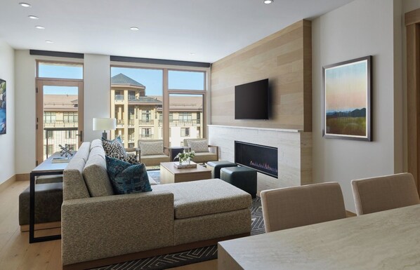 Sectional sofa, work desk, and flat-screen smart TV