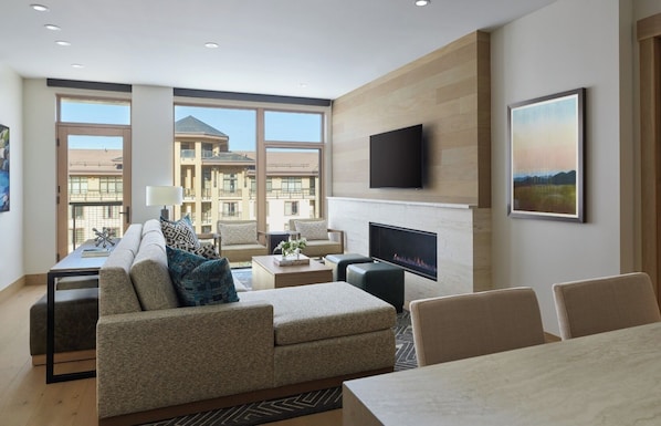 Sectional sofa, work desk, and flat-screen smart TV