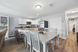 Make mealtime memories together at the dining table, seating 6