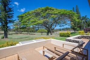 Unwind on the private lanai with outdoor seating—ideal for coffee at sunrise or evening cocktails.