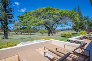 Unwind on the private lanai with outdoor seating—ideal for coffee at sunrise or evening cocktails.