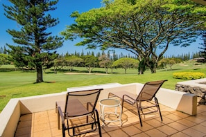 Unwind on the private lanai with outdoor seating—ideal for coffee at sunrise or evening cocktails.