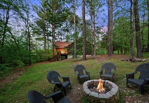 Spark some memories around the fire pit — whether it's storytelling, s'mores, or just soaking up the starry night sky.