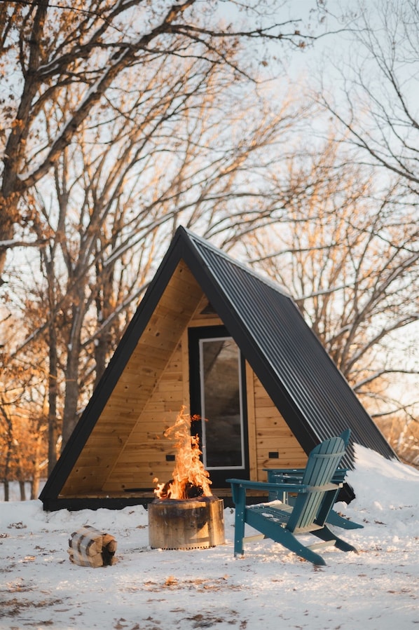 Exterior view of A Frame with Fire pit