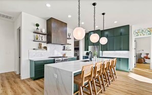 Open-concept living at its finest — cooking, chatting, and hanging out together has never felt so easy and effortless.