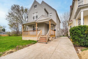 Property Exterior | Spacious Yard | Covered Porch