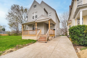 Property Exterior | Spacious Yard | Covered Porch