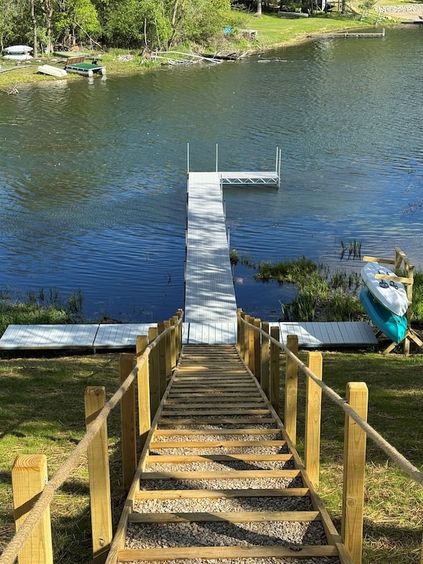 A gentle, steady slope leads you down toward the water, making the walk to the lake feel like part of the experience.