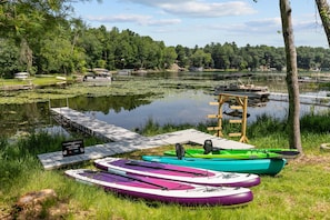 Included with your stay: kayaks and paddleboards ready to launch for hours of lake fun and exploration.