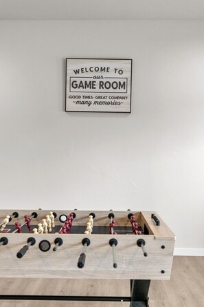 Let the friendly competition begin! Gather around the foosball table downstairs for laughs, quick hands, and unforgettable game nights with family and friends.