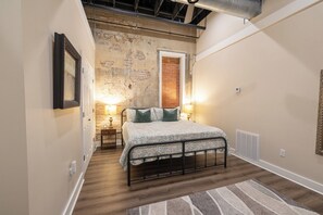 Sleep like a local in comfort and style — plush king bed + Southern charm in your own Home Town retreat.