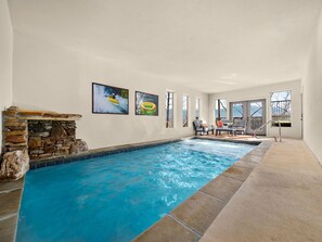 Relax and swim in the indoor pool, where panoramic mountain views make every moment special.