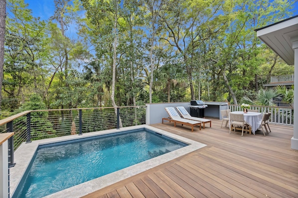 Enjoy the beautiful Kiawah ambiance from the pool and back deck