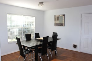 Modern dining table set for six guests