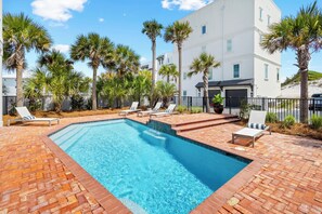Beautiful outdoor space complete with heated pool and outdoor dining,