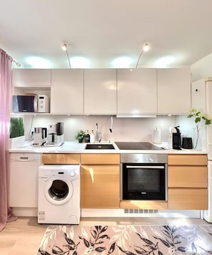A kitchen so well-equipped, even the oven is proud of itself.