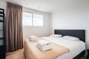 Unwind in comfort in this serene and inviting bedroom.