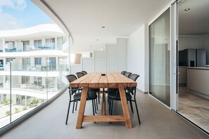 Gather for unforgettable moments at this stylish outdoor dining area.