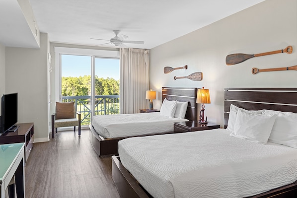 Two cozy queen beds to relax after a day in the sun.