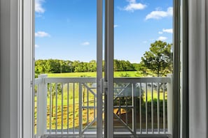 Step out for a breath of fresh air and a calming nature view.