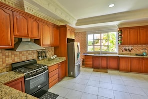 Full kitchen w/ washer and dryer, 2 fridges for extra space!
