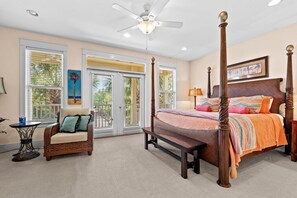 Wake up in comfort with natural light streaming through the large windows and private patio doors.