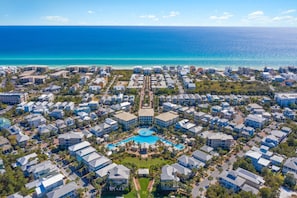 Enjoy a bird’s-eye view of Seacrest Beach’s iconic 12,000-square-foot lagoon-style pool, just a short stroll from the emerald waters of the Gulf.