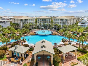 Enjoy access to one of the most stunning resort-style pools on 30A, surrounded by palm trees and upscale amenities.