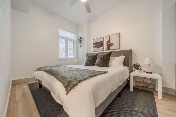 As you enter the bedroom, the comfortable bedding and peaceful atmosphere create the perfect retreat from the day.