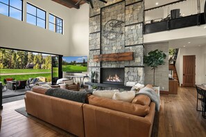 Living the Dream: - Stunning bluestone fireplace! Enjoy the Nano folding doors leading to the spacious patio.