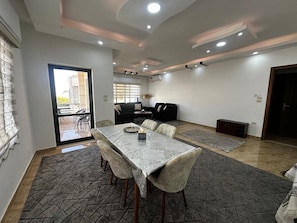 dining area in salon, with balcony, seats 6