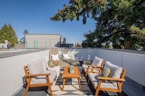 Unwind with a view – rooftop lounging at its finest.