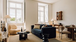 Bright living room with cozy seating, natural light, elegant decor, wooden floors, and warm, inviting ambiance.
#LivingRoom
#CozyHome
#InteriorDesign
#NaturalLight
#AndoLiving