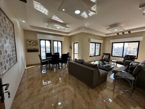 salon with sitting area and dining room