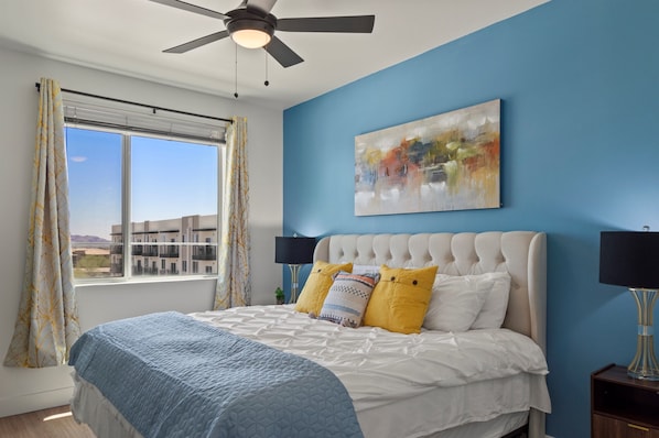 A serene sanctuary with plush bedding and soft lighting for ultimate relaxation.