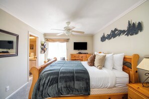 The bedroom offers a queen bed and ensuite bathroom.