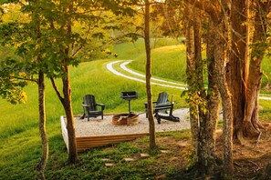 Gather around the firepit with friends and family while you soak in all that this cabin has to offer