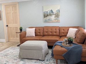 Livingroom is open concept looking into the dining area
