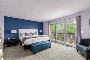 Sink into a plush king-size bed with crisp white linens.